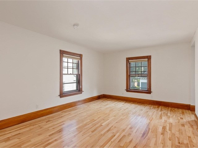 159 Loomis St, Burlington, VT 05401 - spare room featuring light wood-type flooring and a smoke detector