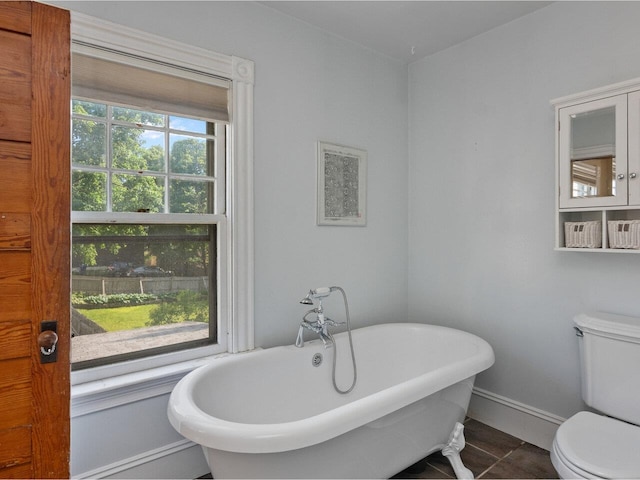 159 Loomis St, Burlington, VT 05401 - bathroom featuring a freestanding tub and tile patterned flooring
