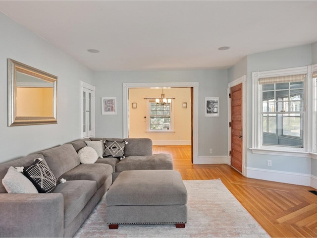 159 Loomis St, Burlington, VT 05401 - living room with a chandelier and baseboards