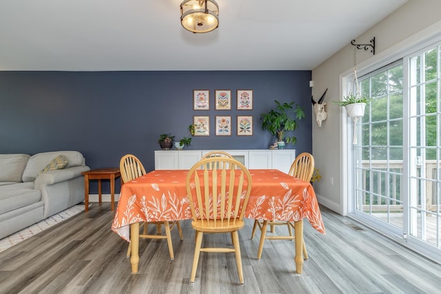 5 Turnpike St, Pembroke, NH 03275 - dining room with light wood-style floors and baseboards