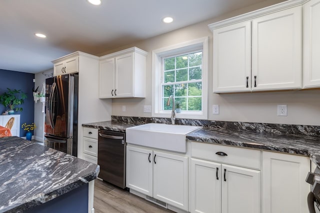 5 Turnpike St, Pembroke, NH 03275 - kitchen featuring freestanding refrigerator, dishwasher, white cabinets, light wood-style floors, and recessed lighting