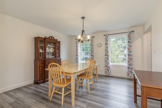 5 Turnpike St, Pembroke, NH 03275 - dining room featuring a chandelier and light wood-style floors
