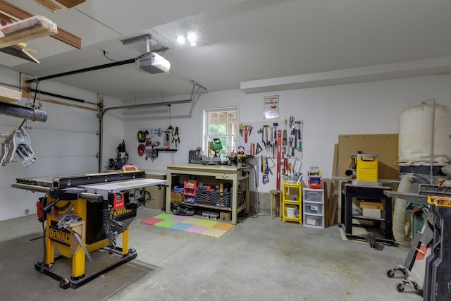 5 Turnpike St, Pembroke, NH 03275 - garage with a workshop area and a garage door opener