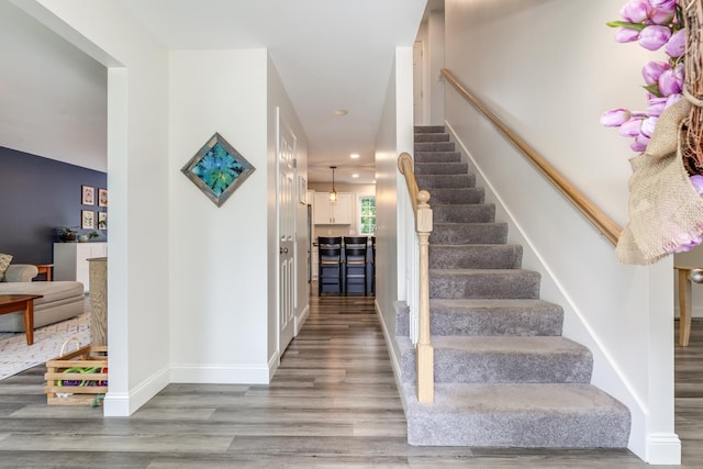 5 Turnpike St, Pembroke, NH 03275 - stairs featuring wood finished floors and recessed lighting