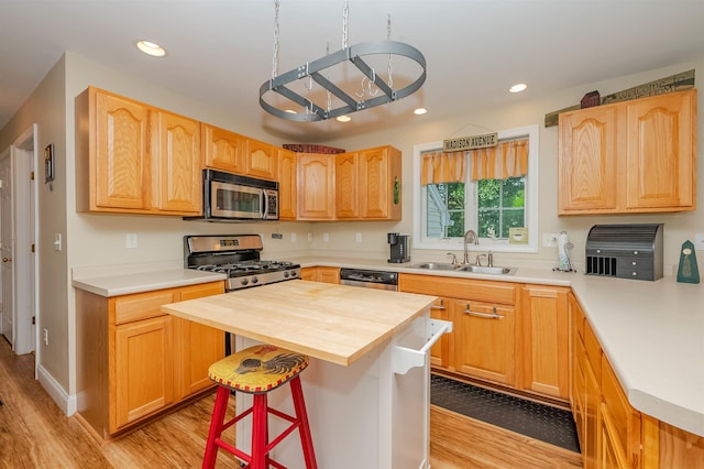20 Brenda Ln, Rochester, NH 03867 - kitchen featuring stainless steel appliances, wooden counters, light wood-style floors, and recessed lighting