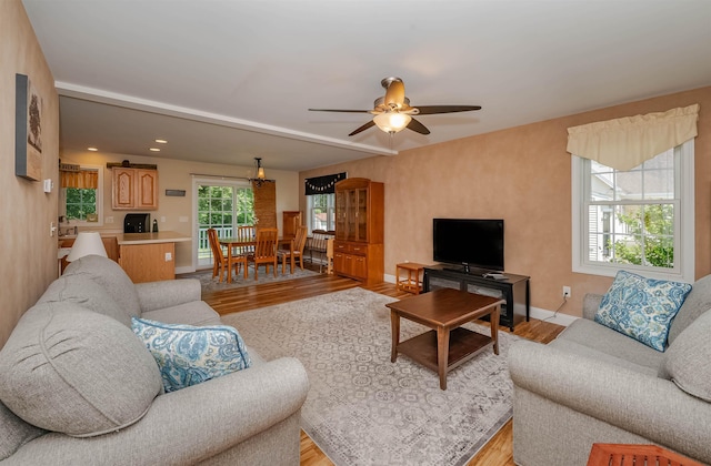 20 Brenda Ln, Rochester, NH 03867 - living room with light wood-style flooring, a ceiling fan, and recessed lighting
