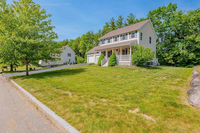 20 Brenda Ln, Rochester, NH 03867 - colonial inspired home featuring covered porch and a front lawn