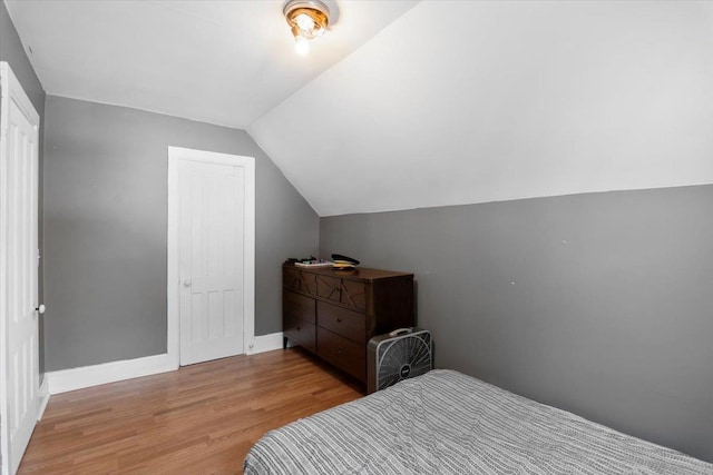 226 N St, Bennington, VT 05201 - bedroom with wood finished floors, lofted ceiling, and a closet