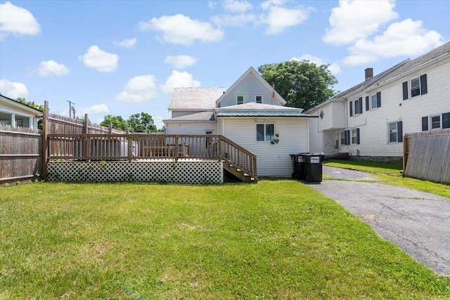 226 N St, Bennington, VT 05201 - rear view of property with a deck and a metal roof
