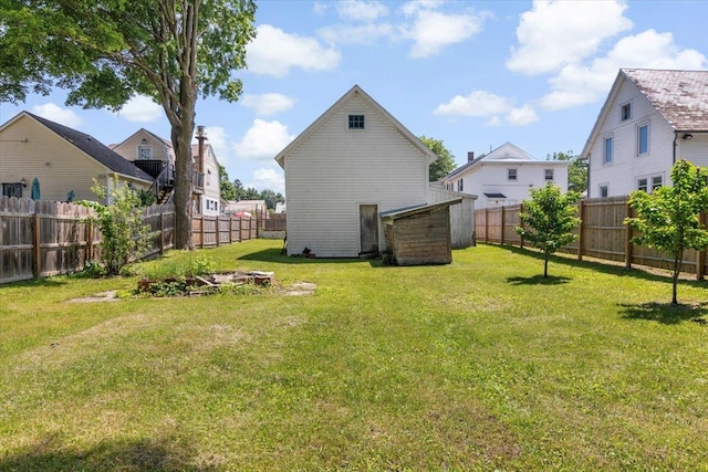 226 N St, Bennington, VT 05201 - fenced backyard with a storage unit
