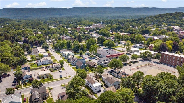 226 N St, Bennington, VT 05201 - drone / aerial view of a forest and mountains