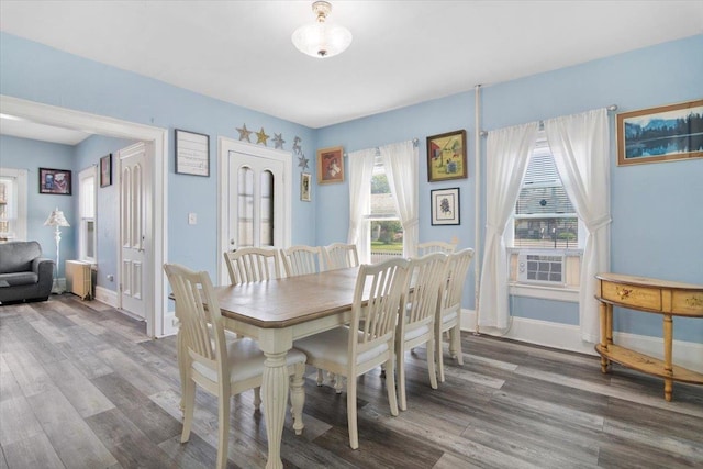 226 N St, Bennington, VT 05201 - dining space with radiator and wood finished floors