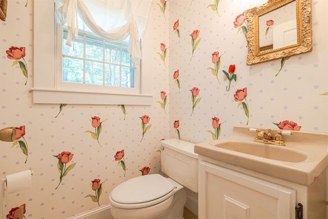 4 Spaulding St, Concord, NH 03301 - bathroom with vanity and wallpapered walls