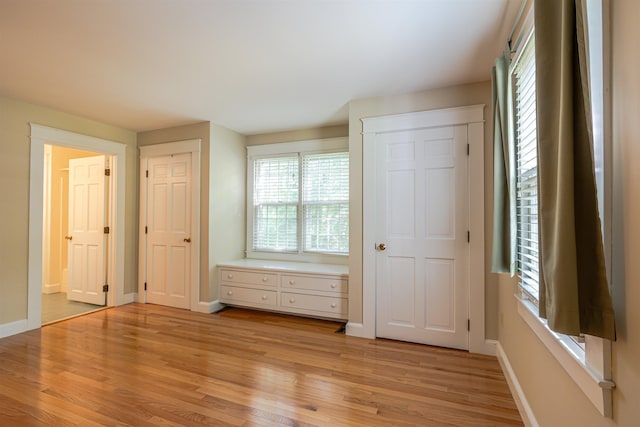 4 Spaulding St, Concord, NH 03301 - unfurnished bedroom featuring light wood-style floors and connected bathroom