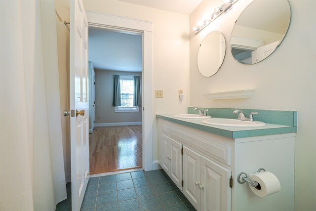 4 Spaulding St, Concord, NH 03301 - full bathroom featuring double vanity and tile patterned floors
