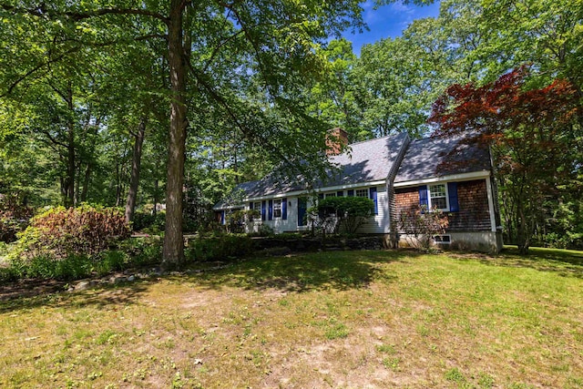 4 Spaulding St, Concord, NH 03301 - view of front of home featuring a front lawn and a chimney