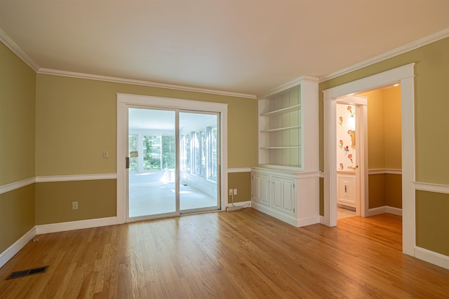 4 Spaulding St, Concord, NH 03301 - empty room with light wood-style floors and ornamental molding