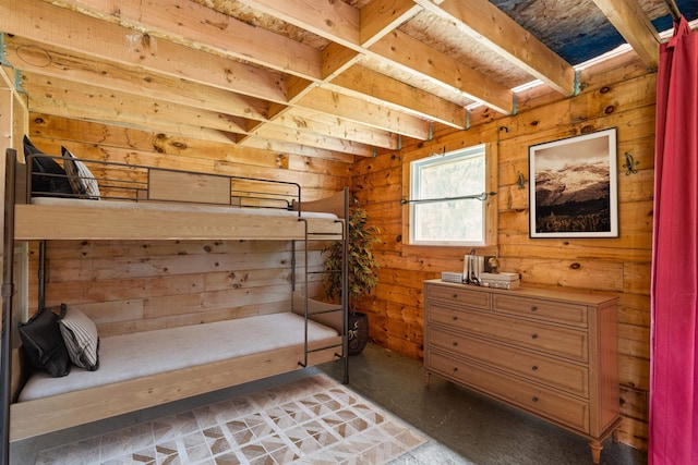 28 New Brighton Hill Rd, Tunbridge, VT 05077 - bedroom featuring wood walls and concrete floors