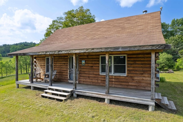28 New Brighton Hill Rd, Tunbridge, VT 05077 - log cabin featuring a front lawn, log siding, and roof with shingles