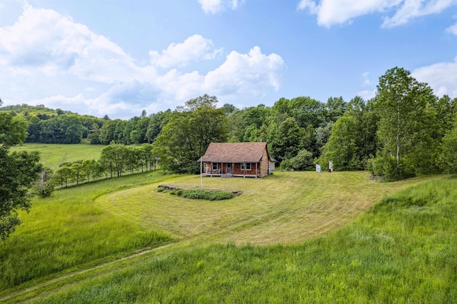28 New Brighton Hill Rd, Tunbridge, VT 05077 - view of grassy yard featuring a view of countryside, a wooded view, and an outdoor structure
