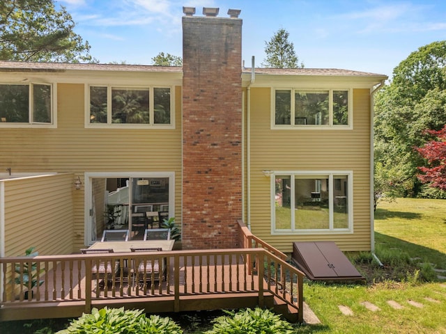 13 Judith Dr, Concord, NH 03301 - rear view of property with a deck, a chimney, and a yard
