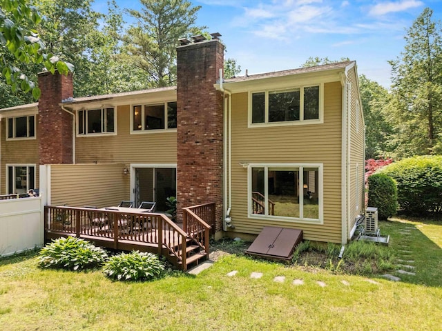 13 Judith Dr, Concord, NH 03301 - rear view of property featuring a chimney, a wooden deck, and a yard