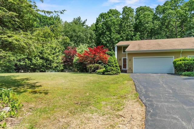 13 Judith Dr, Concord, NH 03301 - view of front of property with driveway, a garage, and a front yard