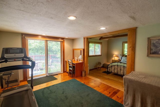 14 Mountain Ridge Rd, Ossipee, NH 03814 - bedroom with hardwood / wood-style floors, a textured ceiling, and recessed lighting