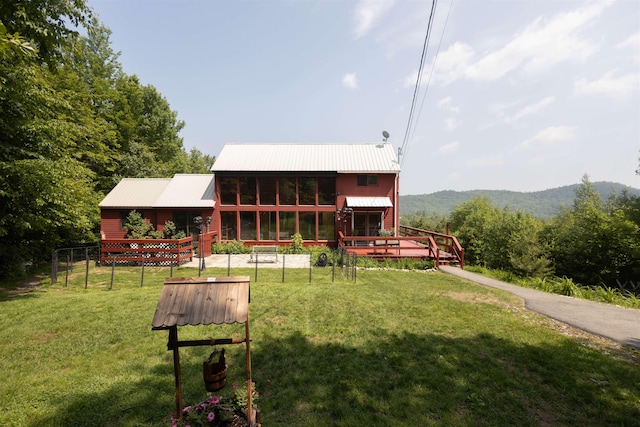 14 Mountain Ridge Rd, Ossipee, NH 03814 - back of house featuring a deck and a metal roof