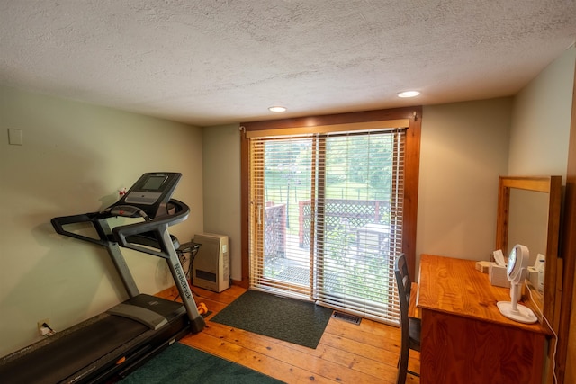 14 Mountain Ridge Rd, Ossipee, NH 03814 - workout room with a textured ceiling, hardwood / wood-style floors, and recessed lighting