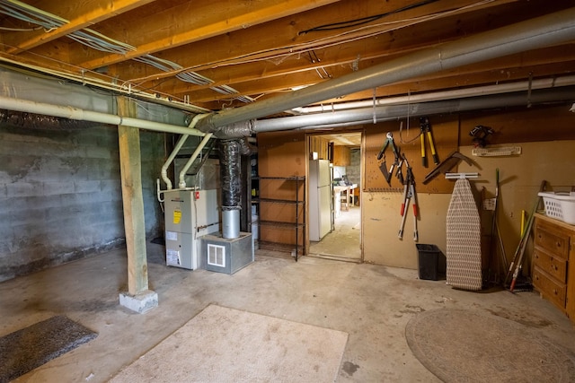 14 Mountain Ridge Rd, Ossipee, NH 03814 - unfinished basement featuring freestanding refrigerator