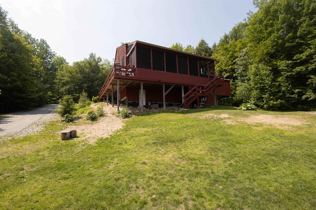 14 Mountain Ridge Rd, Ossipee, NH 03814 - rear view of property with stairs, a wooden deck, a yard, and asphalt driveway