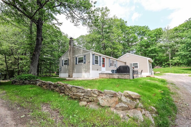 34 Nottingham Rd, Canterbury, NH 03224 - manufactured / mobile home with a chimney and a front lawn
