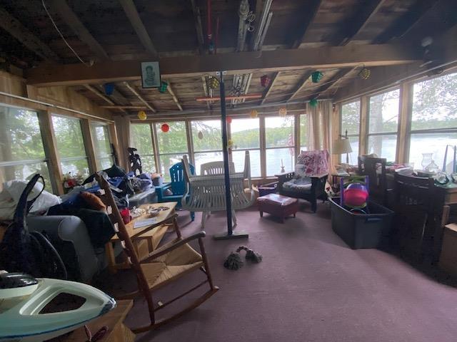 126 Crescent Lake Rd, Acworth, NH 03601 - sunroom with a water view, healthy amount of natural light, and carpet