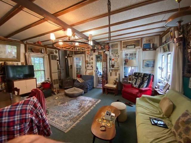 126 Crescent Lake Rd, Acworth, NH 03601 - carpeted living area with a chandelier and beam ceiling