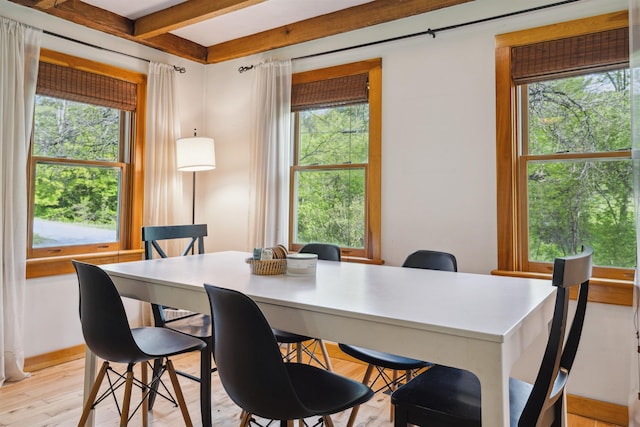 103 Potash Hill Rd, Tunbridge, VT 05077 - dining area with healthy amount of natural light, beamed ceiling, and light wood-type flooring