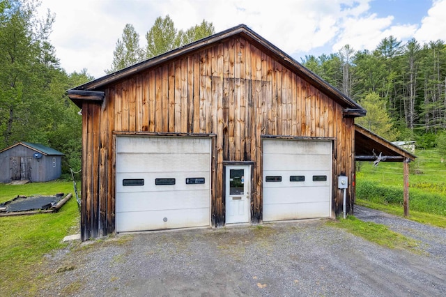 103 Potash Hill Rd, Tunbridge, VT 05077 - detached garage featuring a wooded view