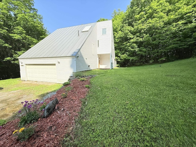 789 Hammond Hill Rd, West Windsor, VT 05089 - view of side of home featuring a yard, a garage, and a metal roof