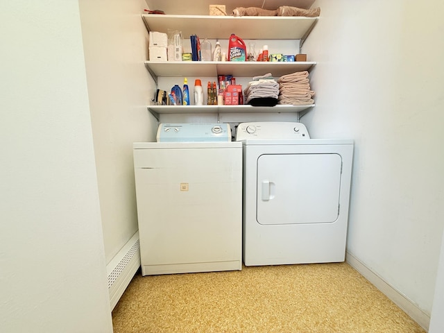 789 Hammond Hill Rd, West Windsor, VT 05089 - laundry room with washing machine and clothes dryer, a baseboard heating unit, and light flooring