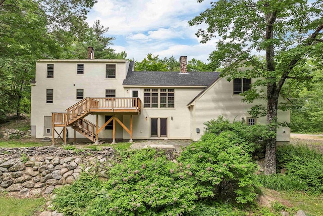 400 Turkey St, Tamworth, NH 03886 - back of house with a wooden deck, stairway, and a chimney