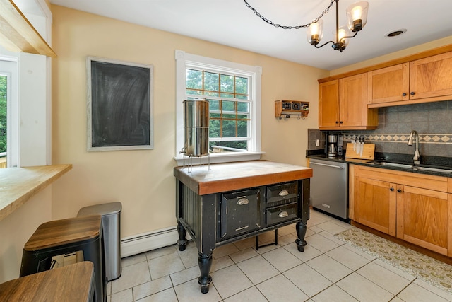 400 Turkey St, Tamworth, NH 03886 - kitchen with stainless steel dishwasher, a baseboard radiator, backsplash, and light tile patterned flooring