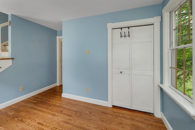 400 Turkey St, Tamworth, NH 03886 - unfurnished bedroom featuring light wood-type flooring and a closet