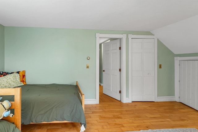 400 Turkey St, Tamworth, NH 03886 - bedroom featuring light wood-type flooring and lofted ceiling