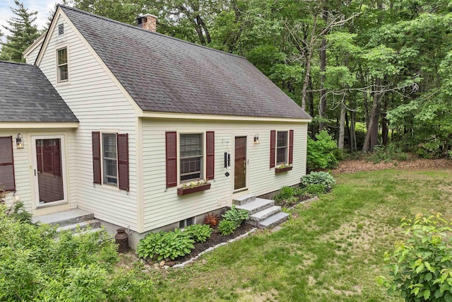 400 Turkey St, Tamworth, NH 03886 - new england style home featuring entry steps, roof with shingles, a front lawn, and a chimney