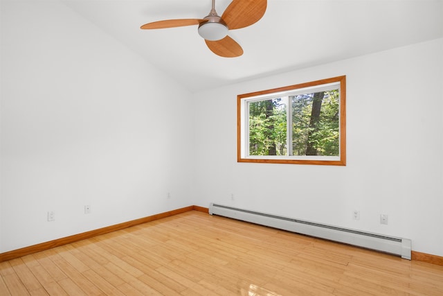 12 Cornwall Pl, Farmington, NH 03835 - spare room featuring a baseboard radiator, light wood-style flooring, lofted ceiling, and ceiling fan