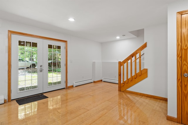 12 Cornwall Pl, Farmington, NH 03835 - doorway with a baseboard radiator, french doors, stairs, recessed lighting, and wood finished floors