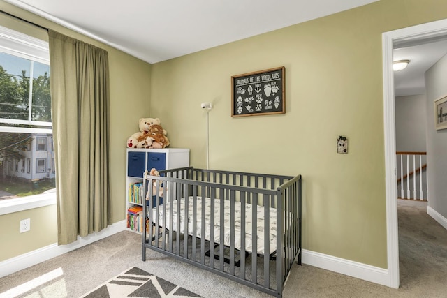 34 Leonard St, Rochester, NH 03867 - bedroom with carpet and a crib