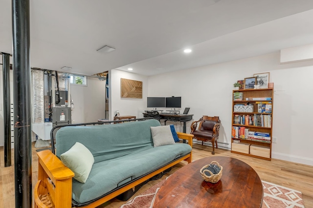 34 Leonard St, Rochester, NH 03867 - living area with wood finished floors and recessed lighting