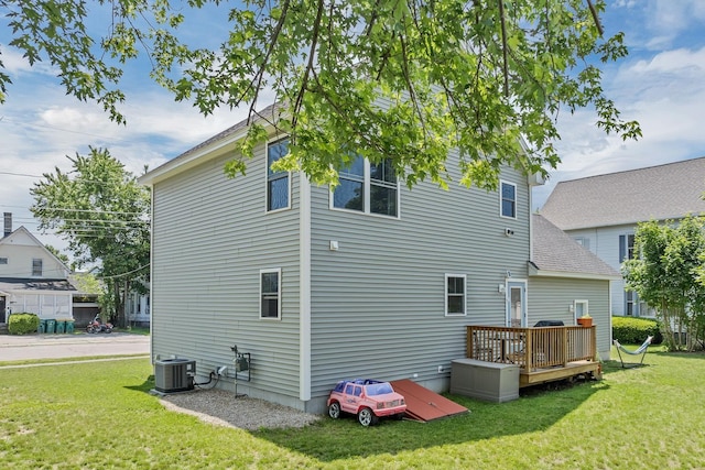34 Leonard St, Rochester, NH 03867 - rear view of house featuring a wooden deck and a yard