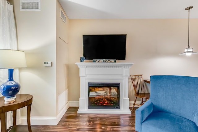 1 Ocean Ave Unit 210/212Fraction 3, York, ME 03909 - living area with wood finished floors and a glass covered fireplace